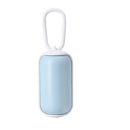 Clip-on poop bag dispenser, included in the Travel Kit